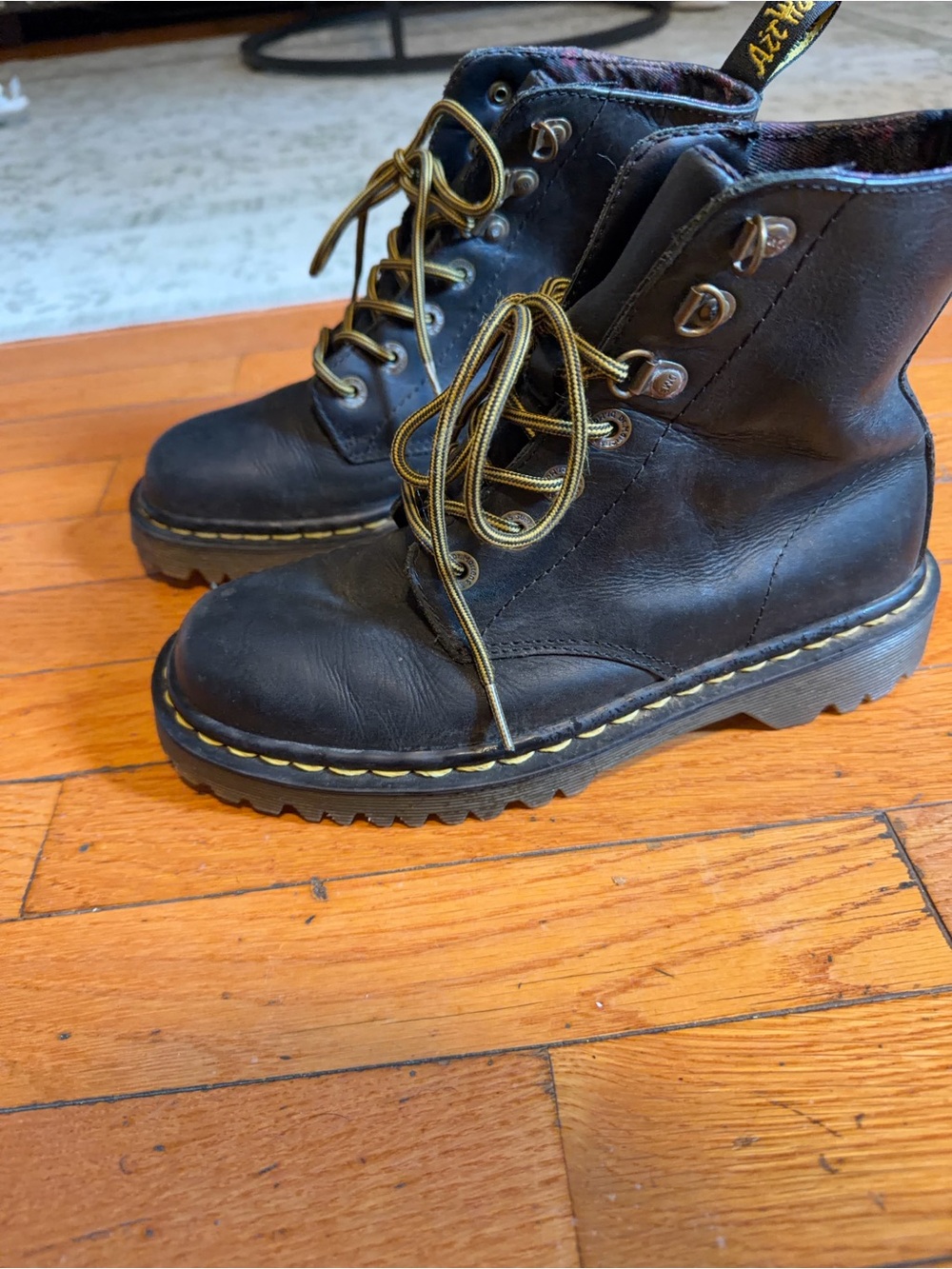Dr. Martens Black Leather Lace-Up Combat Boots with Yellow Stitching